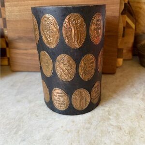 Wood candleholder with stamped copper religious designs
